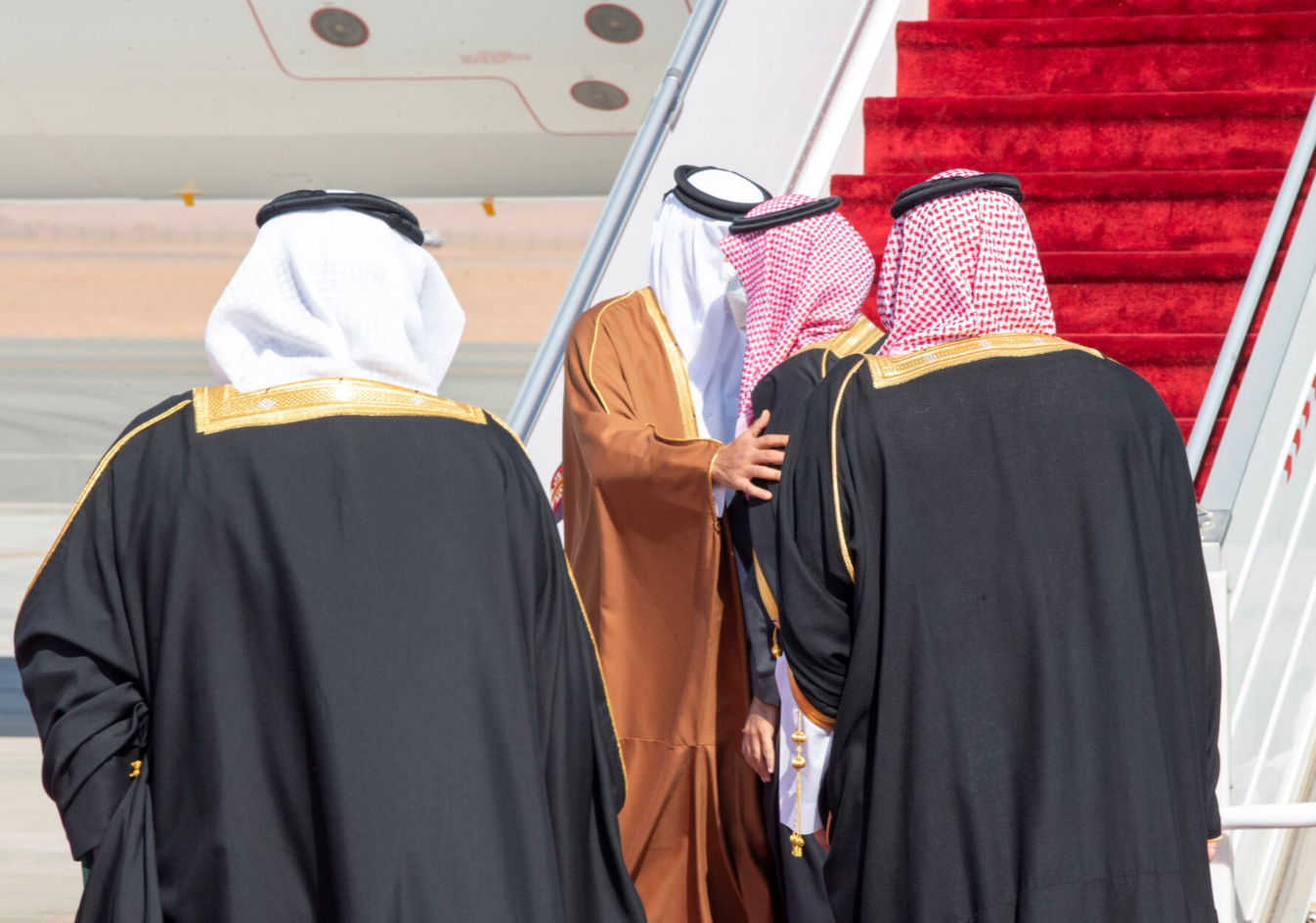 Saudi Arabia's Crown Prince Mohammed bin Salman welcomes Qatar's Emir Sheikh Tamim bin Hamad al-Thani at the Al-Ula GCC Summit, January 5, 2021.
